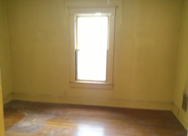 an empty room with a window