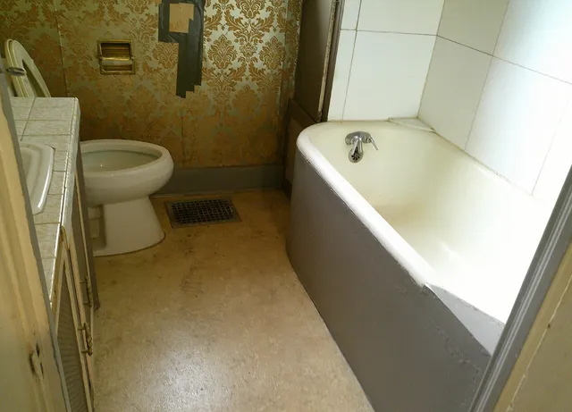 a bathroom with a sink and toilet