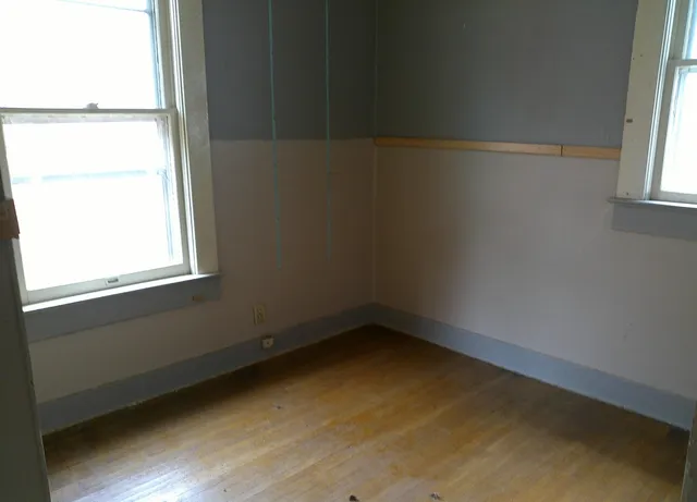 an empty room with a window