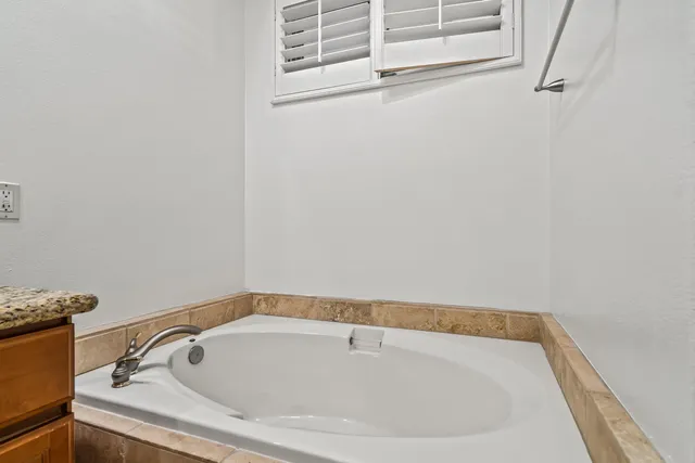 a bathroom with a bathtub