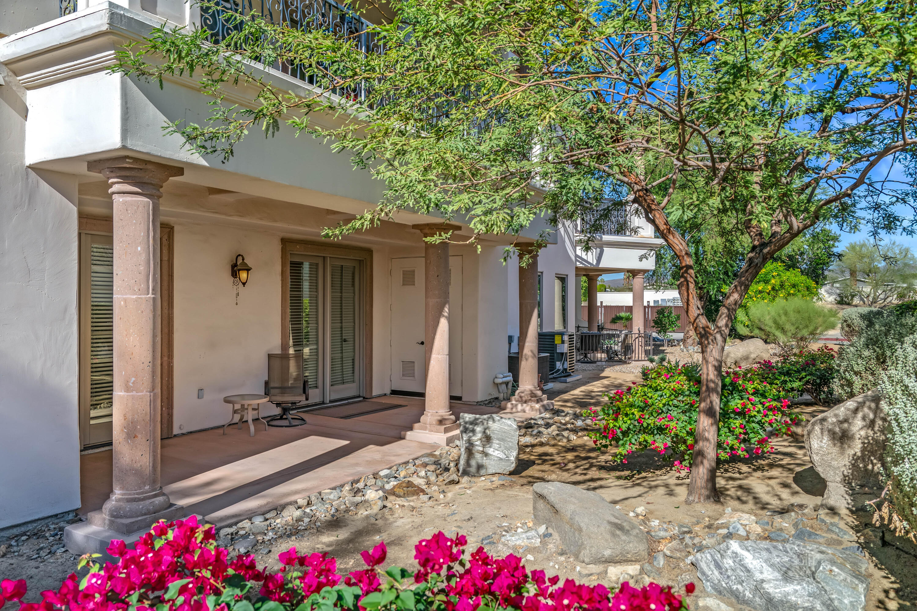 2702 Via Calderia Palm Desert, CA 92260 - Photo 33 of 45 a front view of house with yard