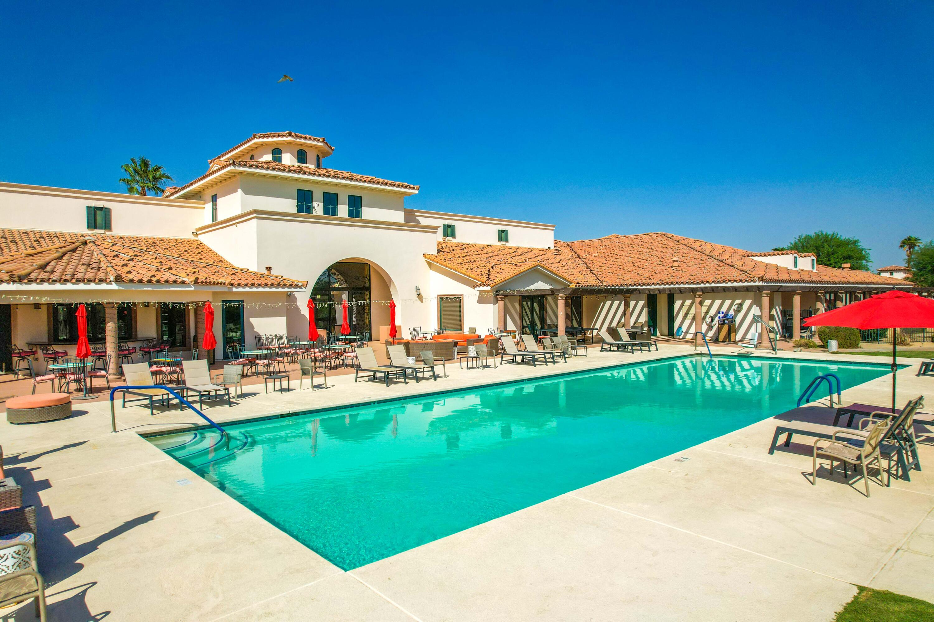 2702 Via Calderia Palm Desert, CA 92260 - Photo 40 of 45 a front view of a house with garden