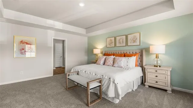 a bathroom with a double vanity sink toilet and shower