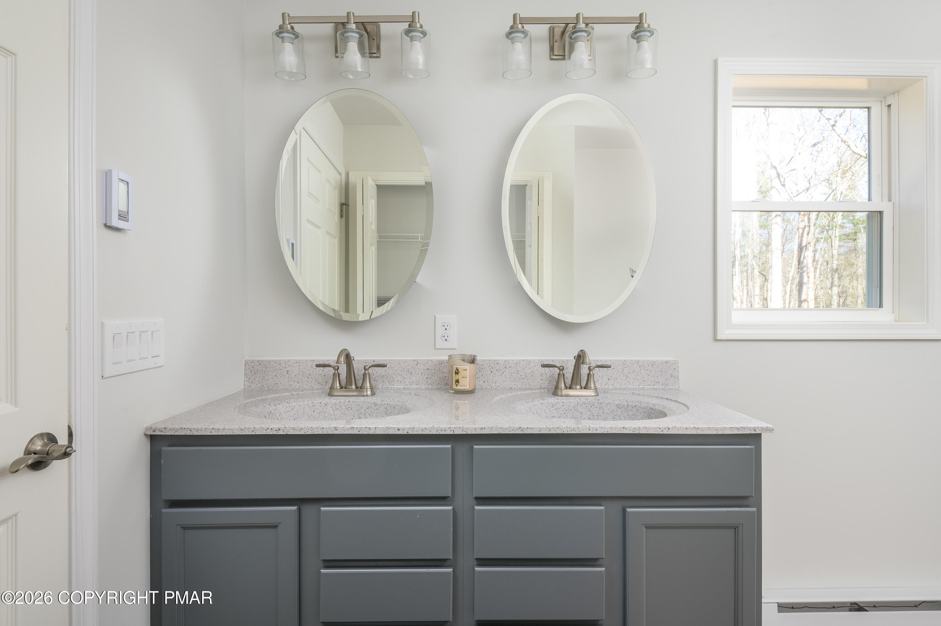 456 Big Oak Road Canadensis, PA 18325 - Photo 17 of 20 a bathroom with a double vanity sink and a mirror