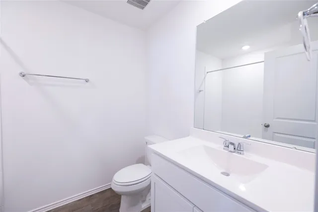 a bathroom with a sink and a toilet