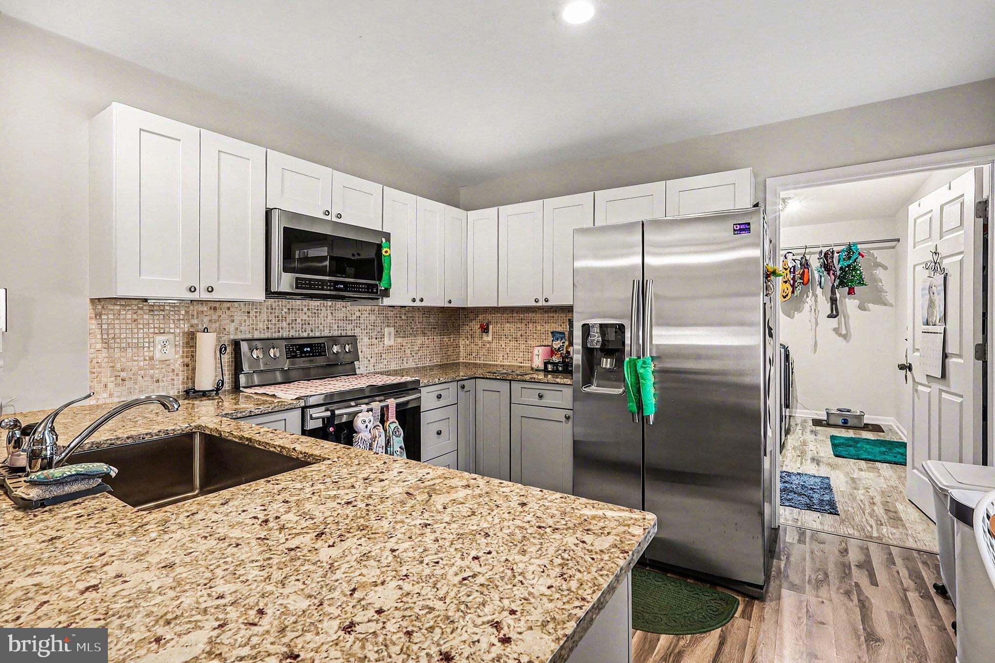 8318 Diamond Hill Road Warrenton, VA 20186 - Photo 24 of 88 In-Law Suite Modern kitchen with sleek finishes.