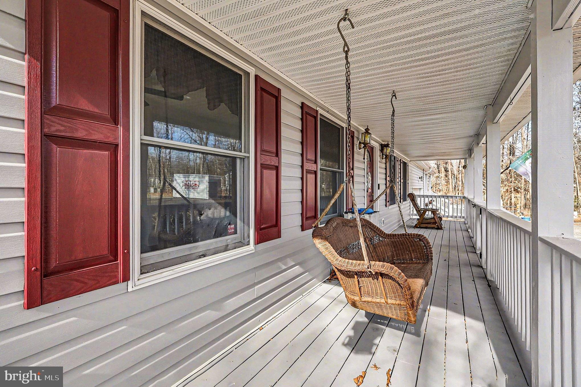 8318 Diamond Hill Road Warrenton, VA 20186 - Photo 28 of 88 Charming porch with inviting swings.