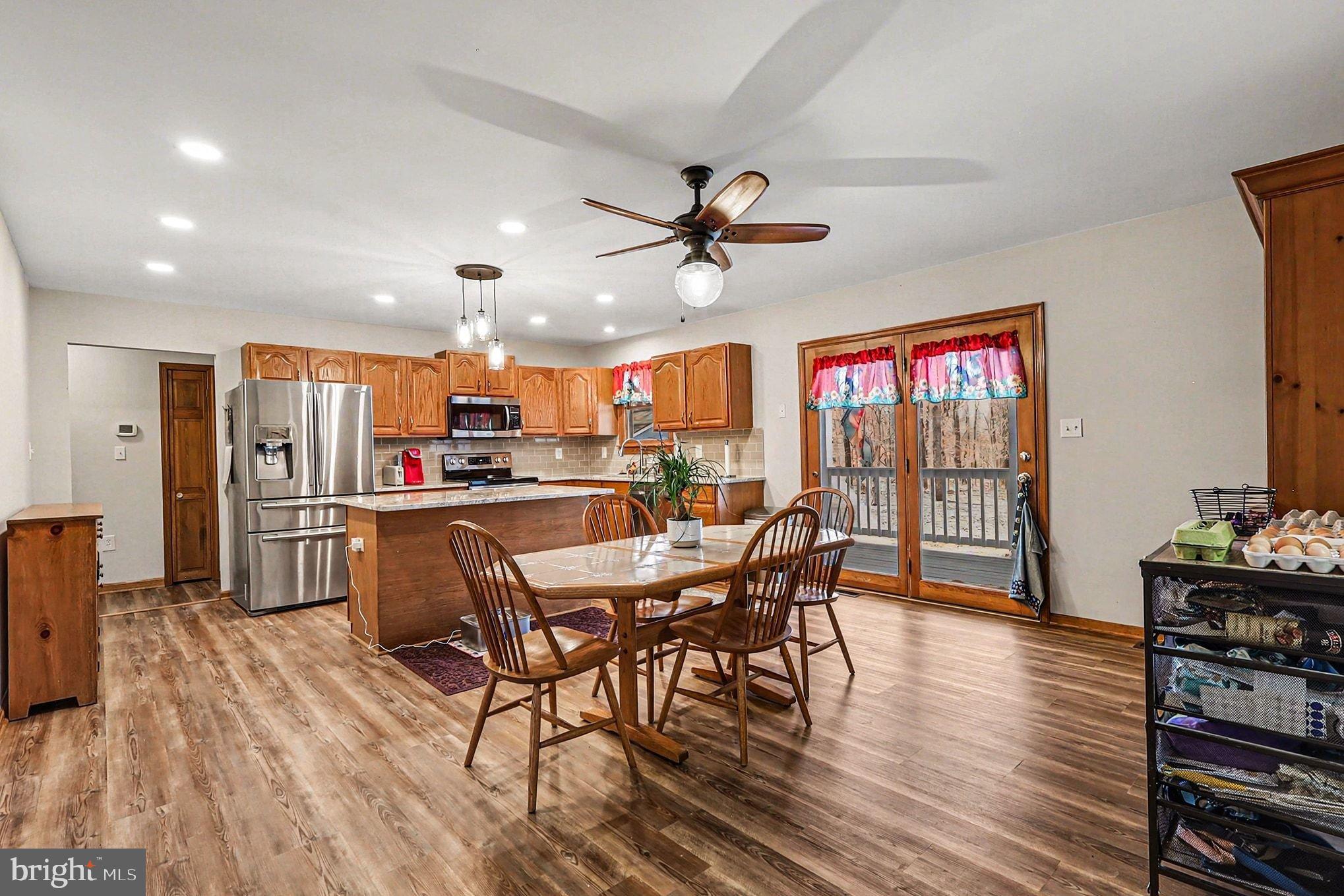 8318 Diamond Hill Road Warrenton, VA 20186 - Photo 4 of 88 a view of a dining room with furniture window and wooden floor