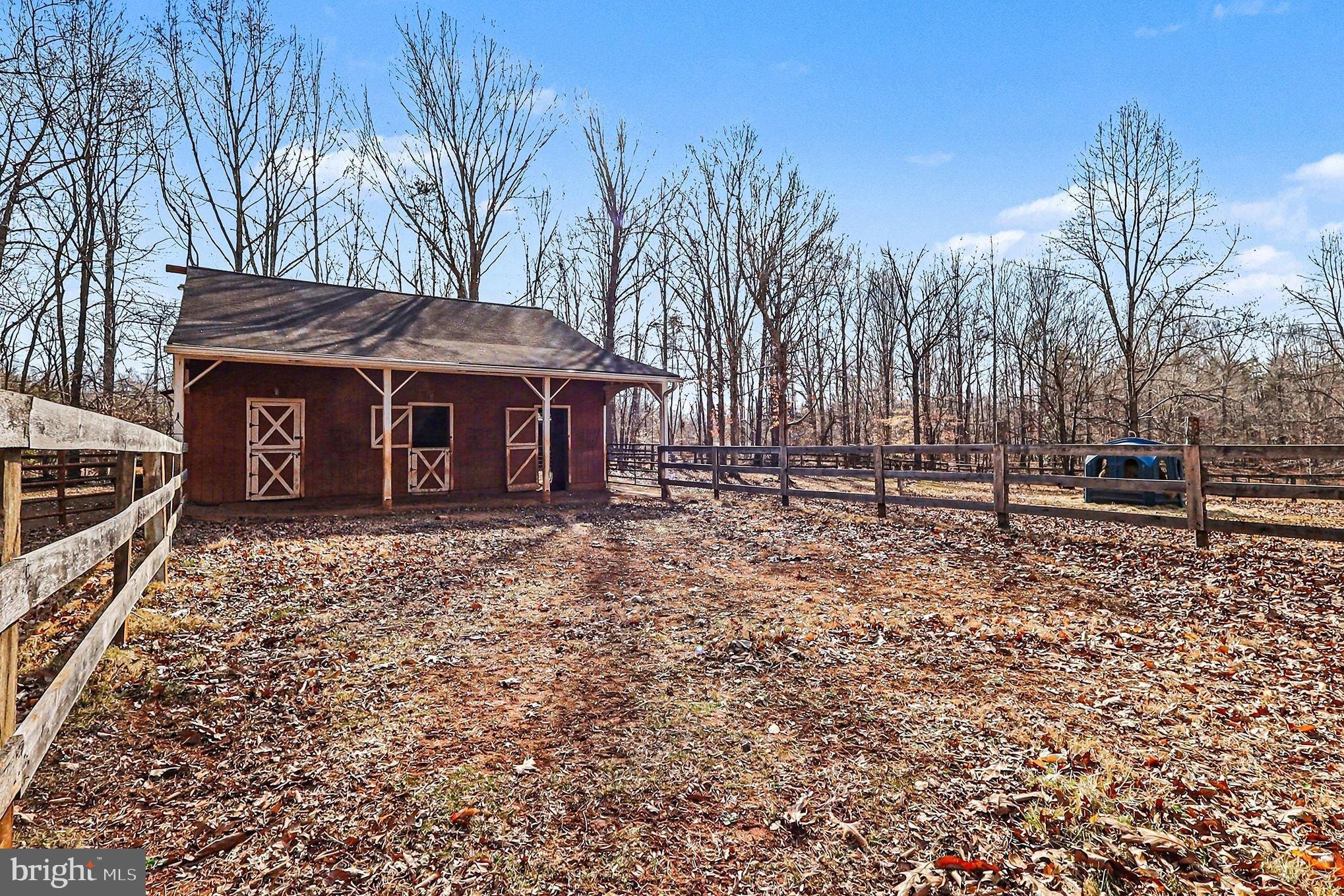 8318 Diamond Hill Road Warrenton, VA 20186 - Photo 49 of 88 a front view of a house with garden