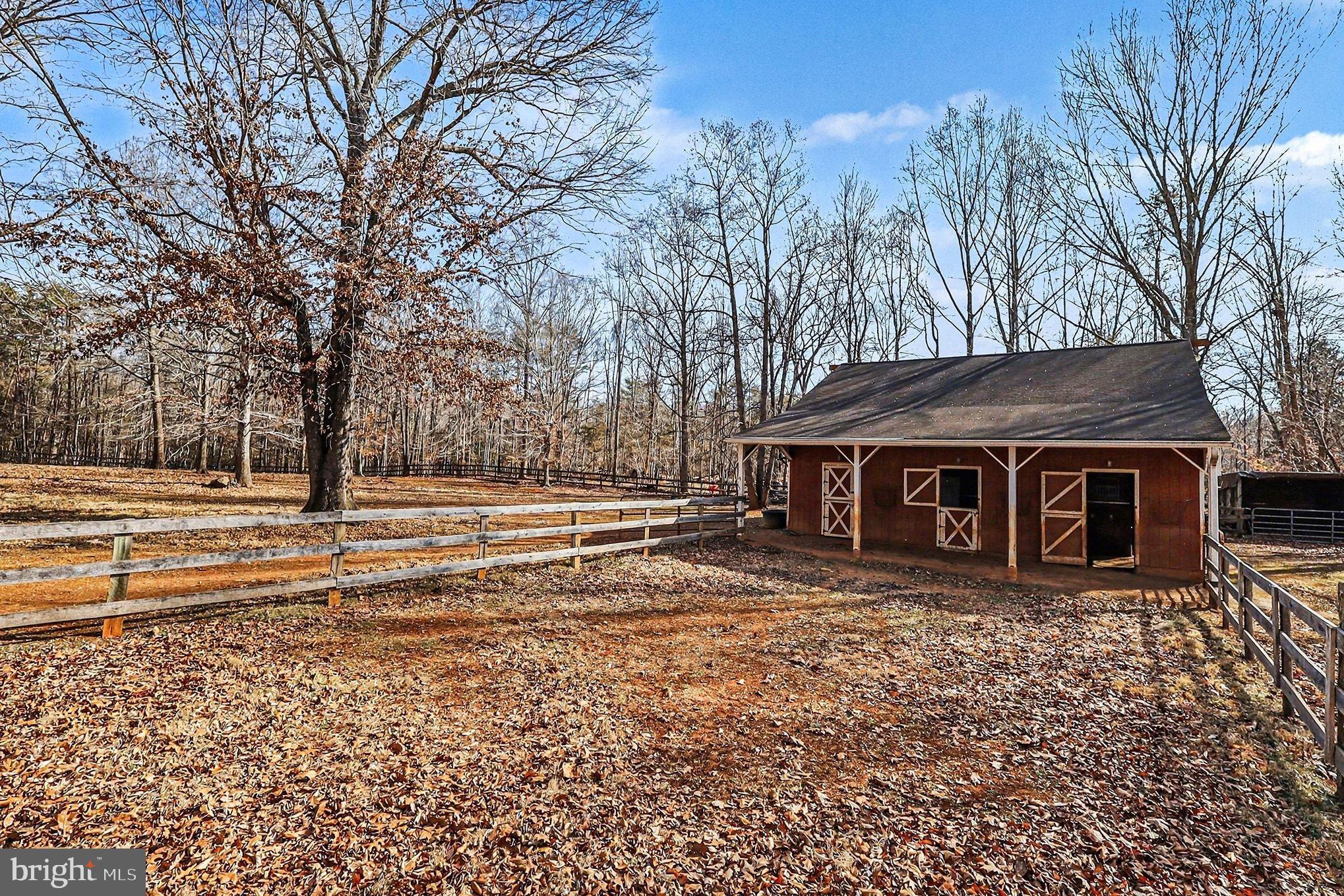 8318 Diamond Hill Road Warrenton, VA 20186 - Photo 50 of 88 a view of a house with a yard