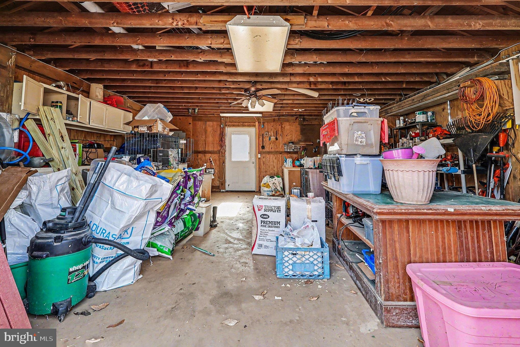 8318 Diamond Hill Road Warrenton, VA 20186 - Photo 60 of 88 Cluttered garage brimming with potential.