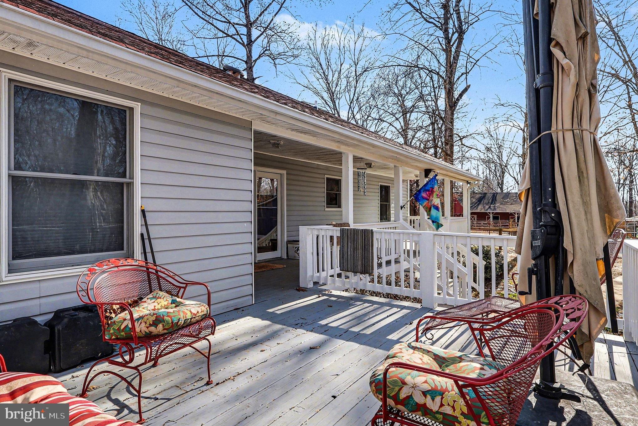8318 Diamond Hill Road Warrenton, VA 20186 - Photo 66 of 88 Charming deck with serene woodland views.