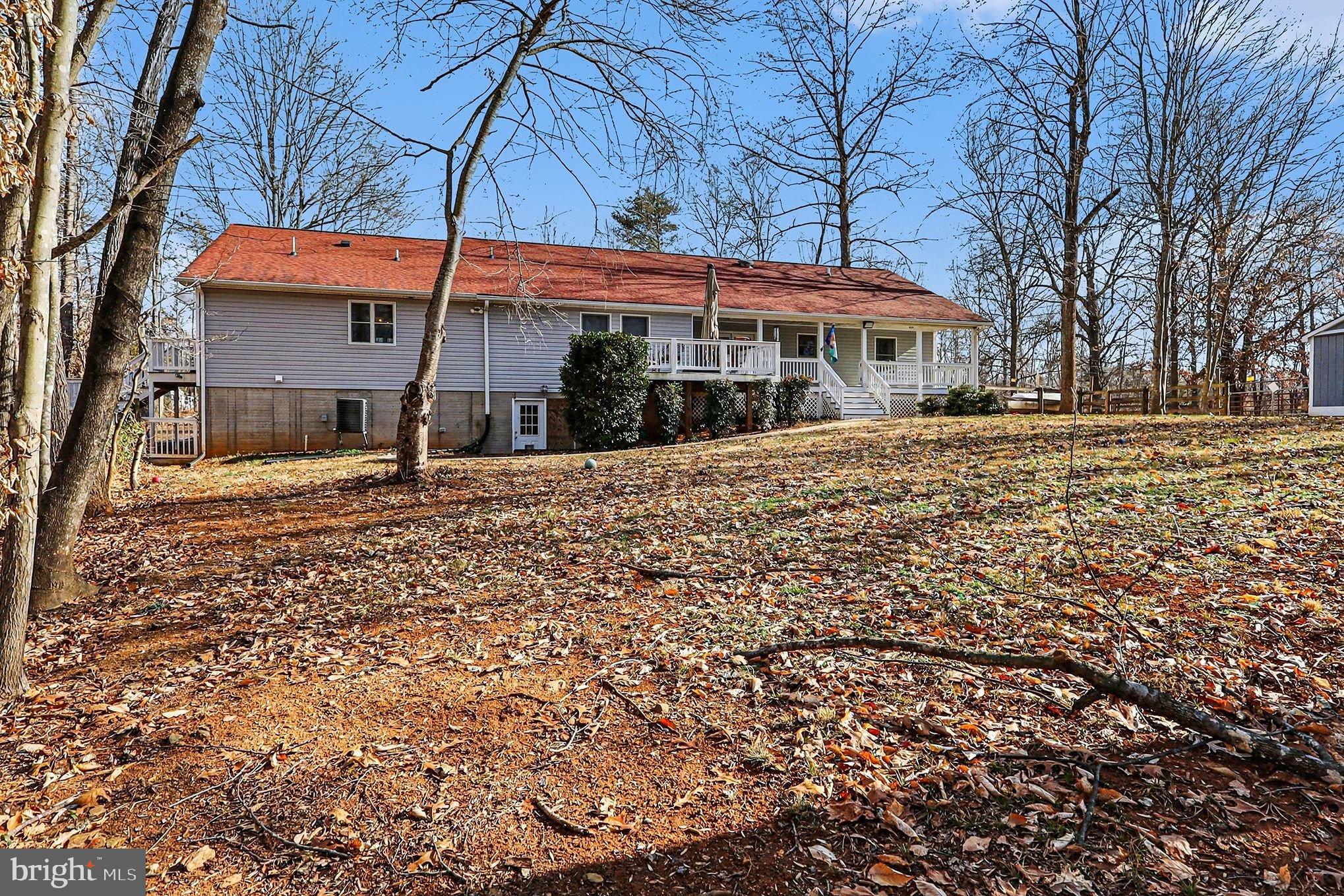 8318 Diamond Hill Road Warrenton, VA 20186 - Photo 67 of 88 a front view of a building with a garden
