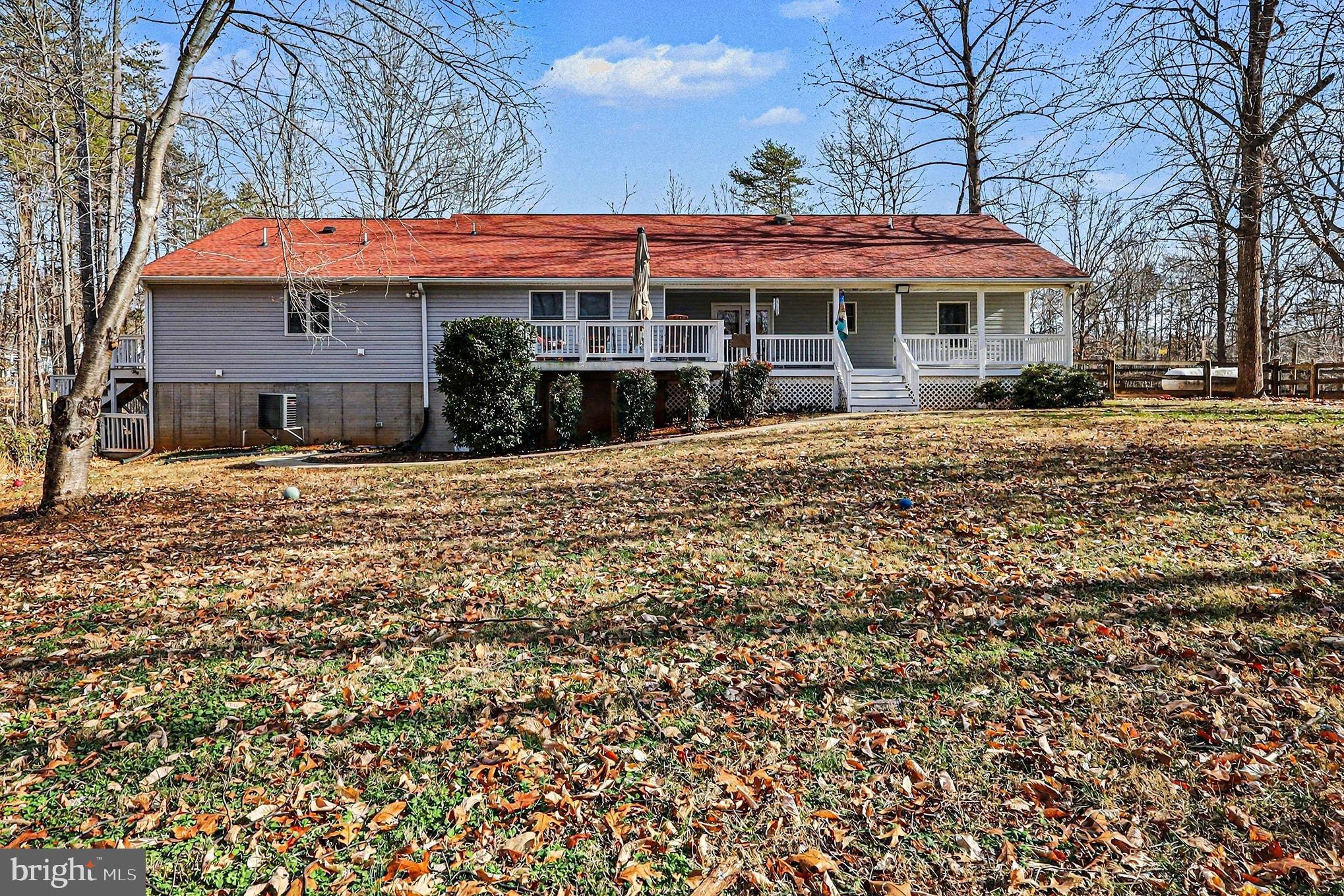 8318 Diamond Hill Road Warrenton, VA 20186 - Photo 70 of 88 a front view of a building with a garden