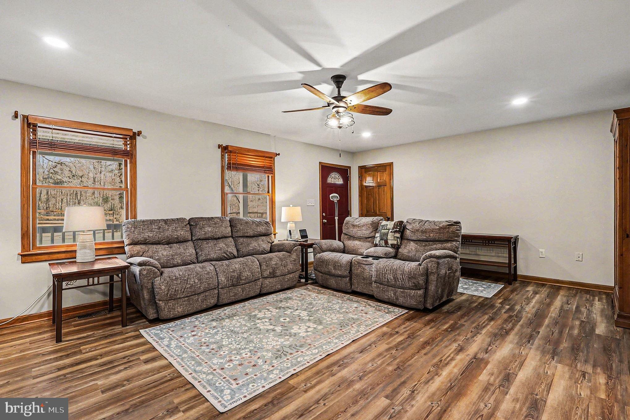 8318 Diamond Hill Road Warrenton, VA 20186 - Photo 8 of 88 a living room with furniture and a wooden floor