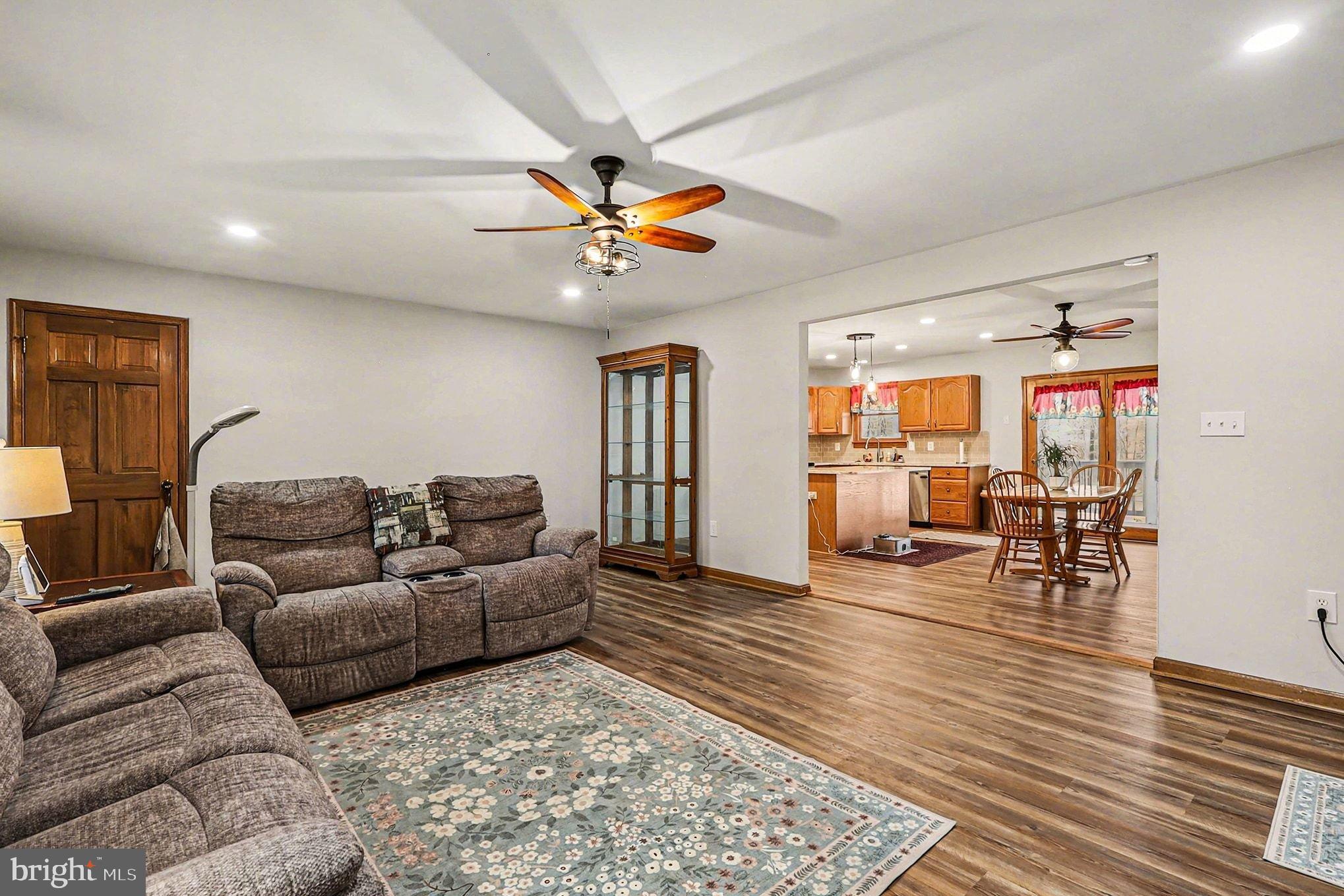 8318 Diamond Hill Road Warrenton, VA 20186 - Photo 9 of 88 a living room with furniture and wooden floor