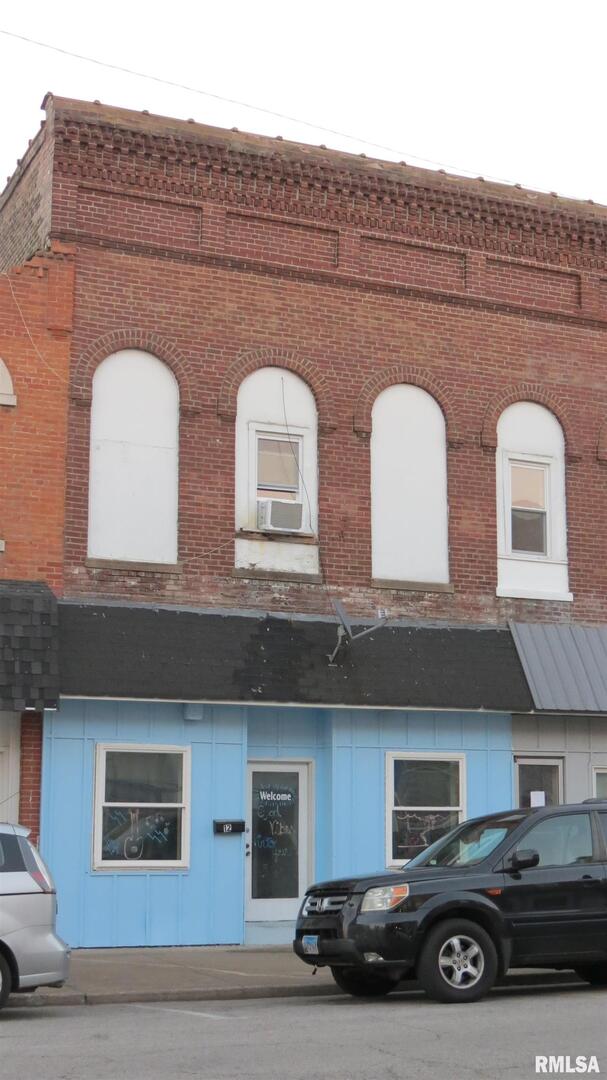 12 North Division Street Du Quoin, IL 62832 - Photo 1 of 21 a view of a car parked in front of a building