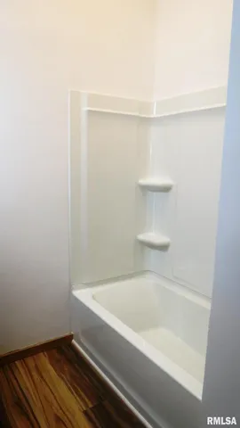 a bathroom with a bathtub