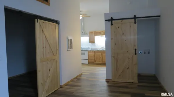 a view of a bathroom from the hallway