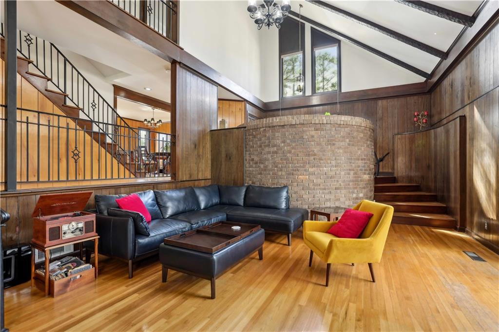 1605 Saint Tropez Way Atlanta, GA 30350 - Photo 9 of 29 a outdoor living space with furniture and a fireplace