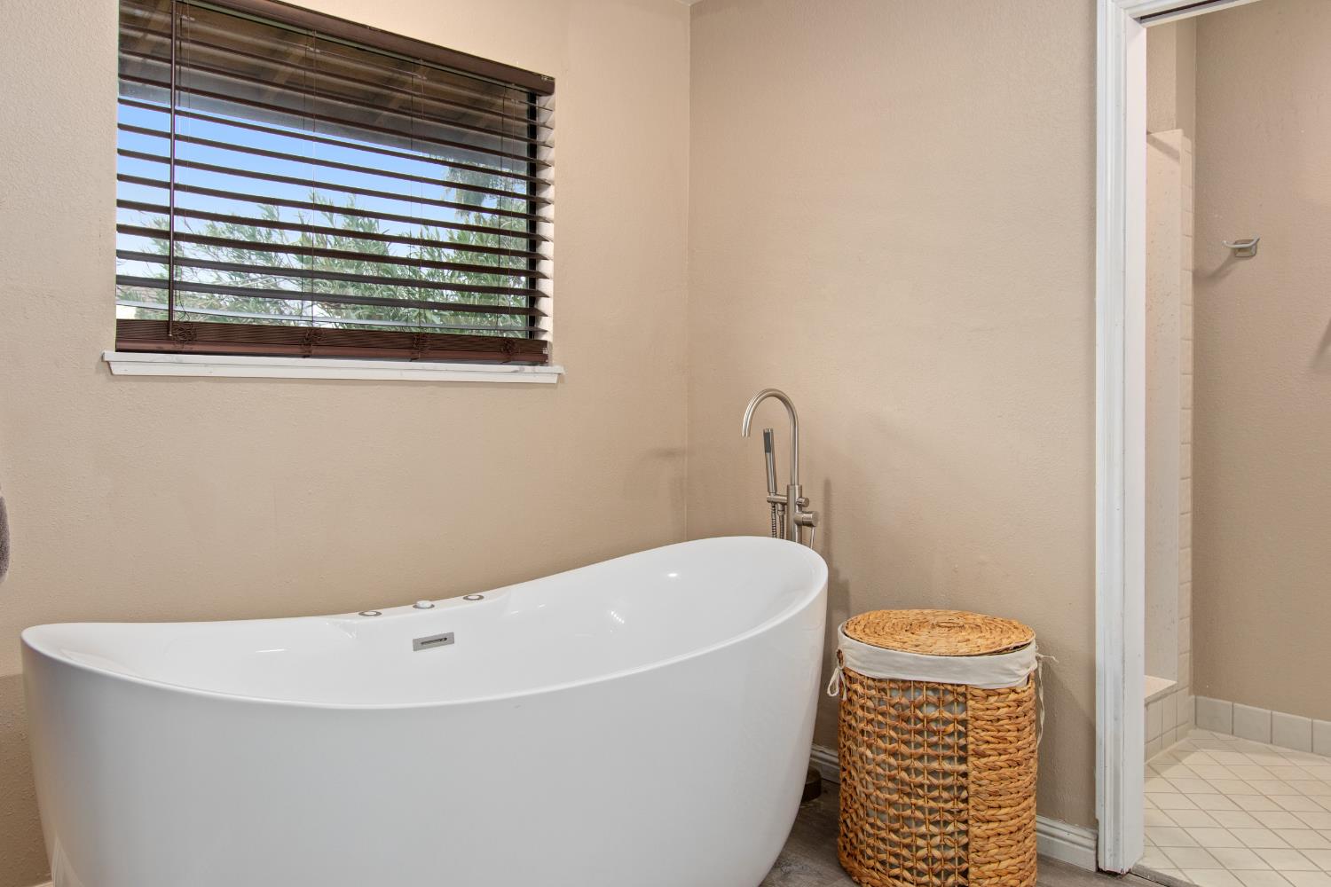17188 Von Sosten Road Tracy, CA 95304 - Photo 29 of 39 a bathroom with a sink and a toilet