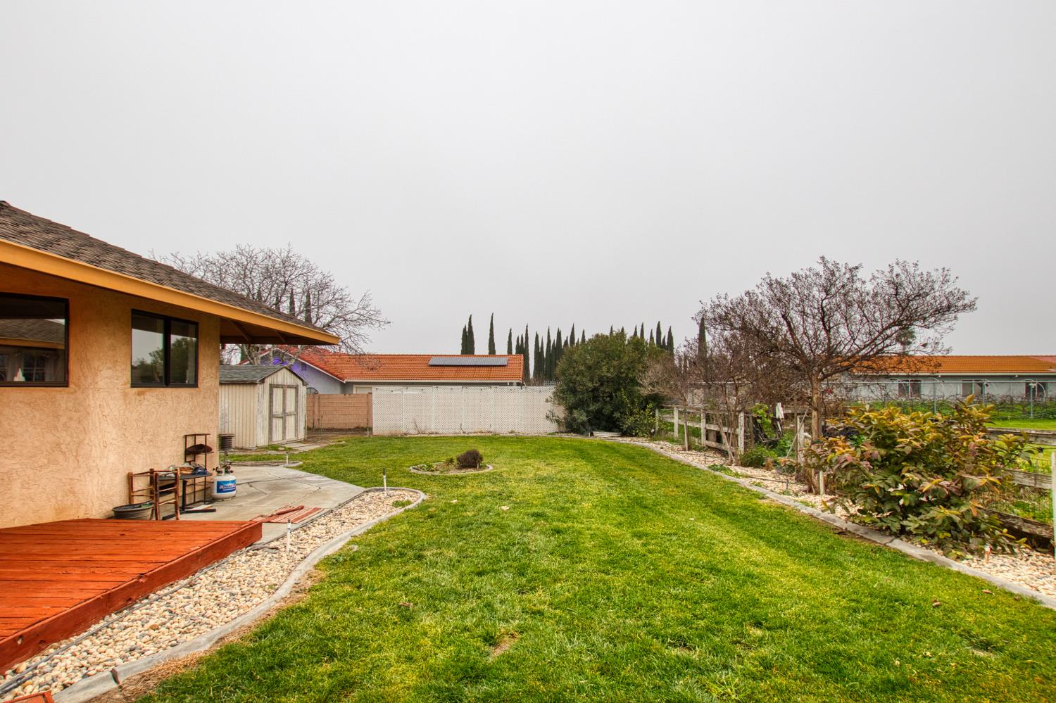 17188 Von Sosten Road Tracy, CA 95304 - Photo 36 of 39 a view of a backyard with plants and a patio
