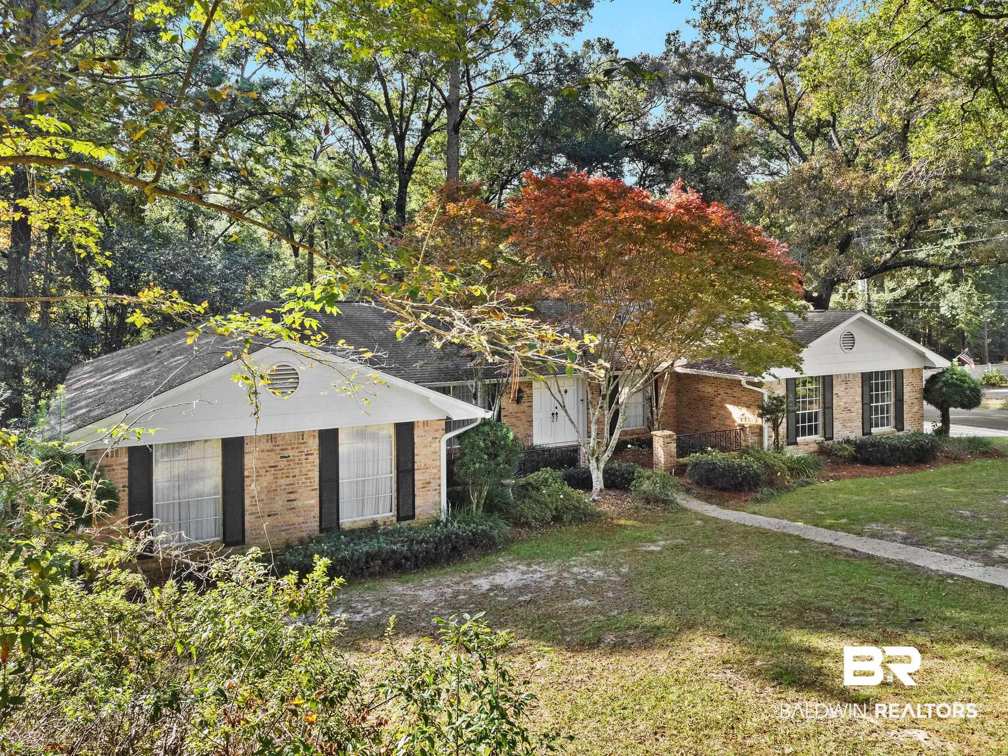 752 Evergreen Street Fairhope, AL 36532 - Photo 98 of 100 Ranch-style house with brick siding and a front lawn