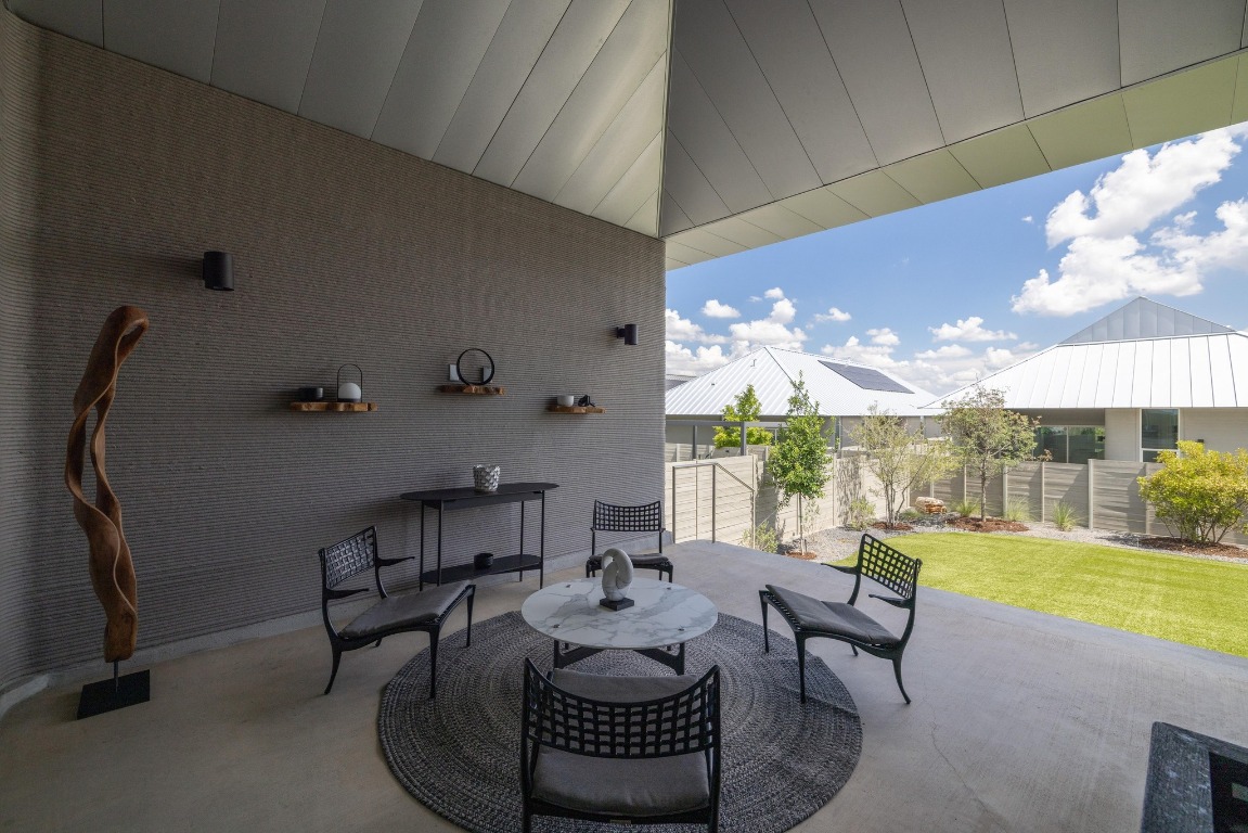 213 Lone Ranger Trail Georgetown, TX 78628 - Photo 22 of 26 a living room with furniture and a large window