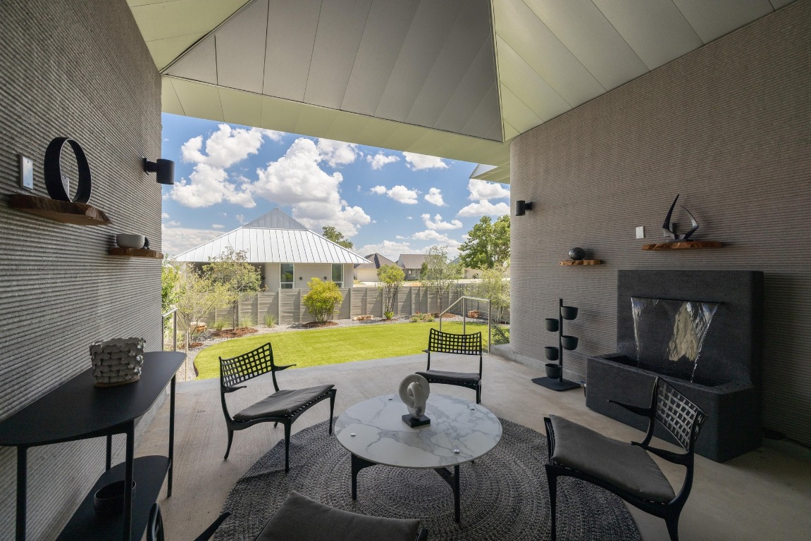213 Lone Ranger Trail Georgetown, TX 78628 - Photo 23 of 26 a living room with furniture and a large window