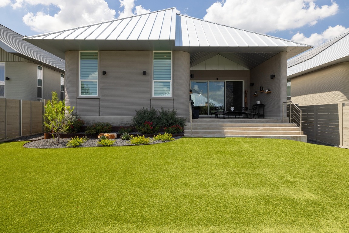 213 Lone Ranger Trail Georgetown, TX 78628 - Photo 26 of 26 a view of a house with swimming pool patio and a yard