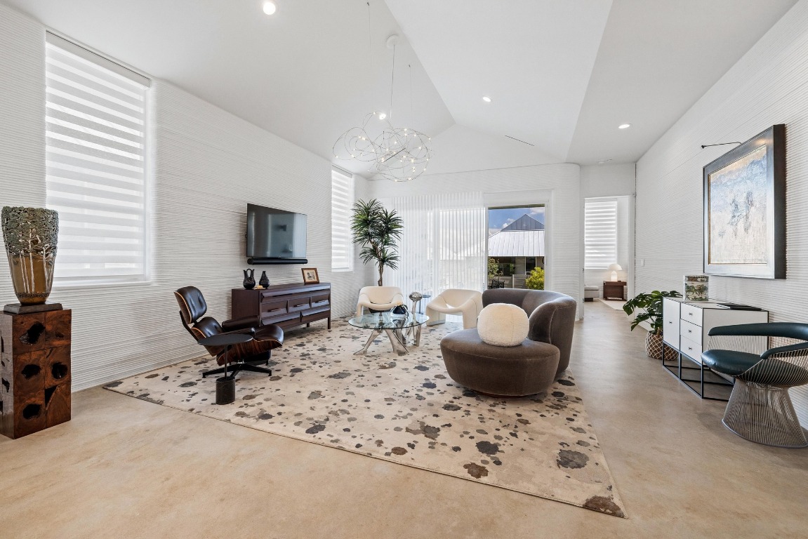 213 Lone Ranger Trail Georgetown, TX 78628 - Photo 6 of 26 a living room with furniture and a flat screen tv