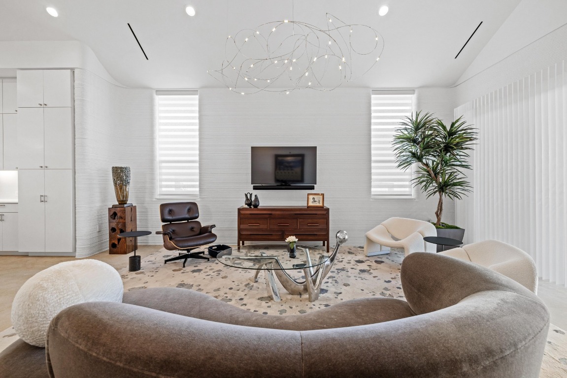 213 Lone Ranger Trail Georgetown, TX 78628 - Photo 9 of 26 a living room with furniture and a flat screen tv