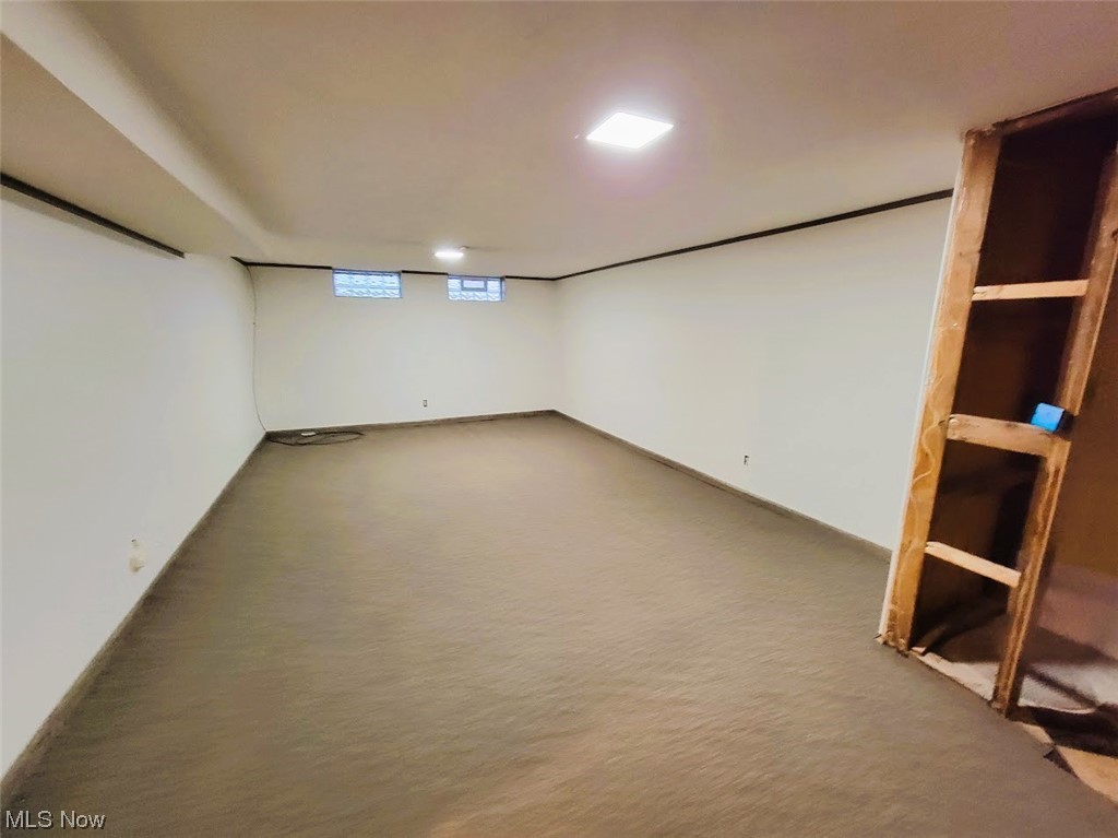 14313 Wheeler Road Maple Heights, OH 44137 - Photo 20 of 28 View of carpeted empty room basement