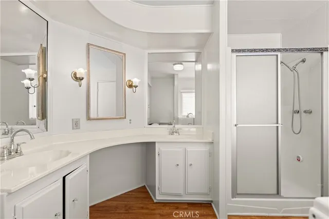 a bathroom with a sink and mirror