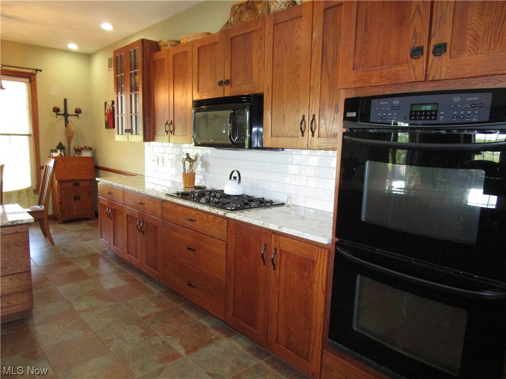 7993 Guilford Road Seville, OH 44273 - Photo 9 of 34 ...double oven, propane cook top....