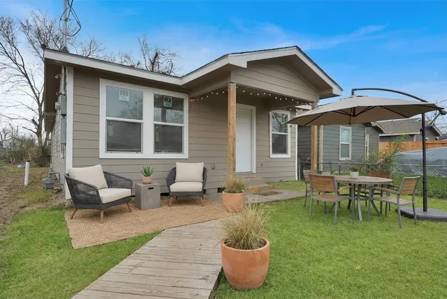 a front view of a house with patio
