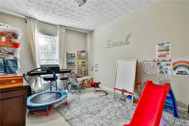 a view of a car garage with parked car