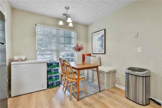 a workspace with furniture and window