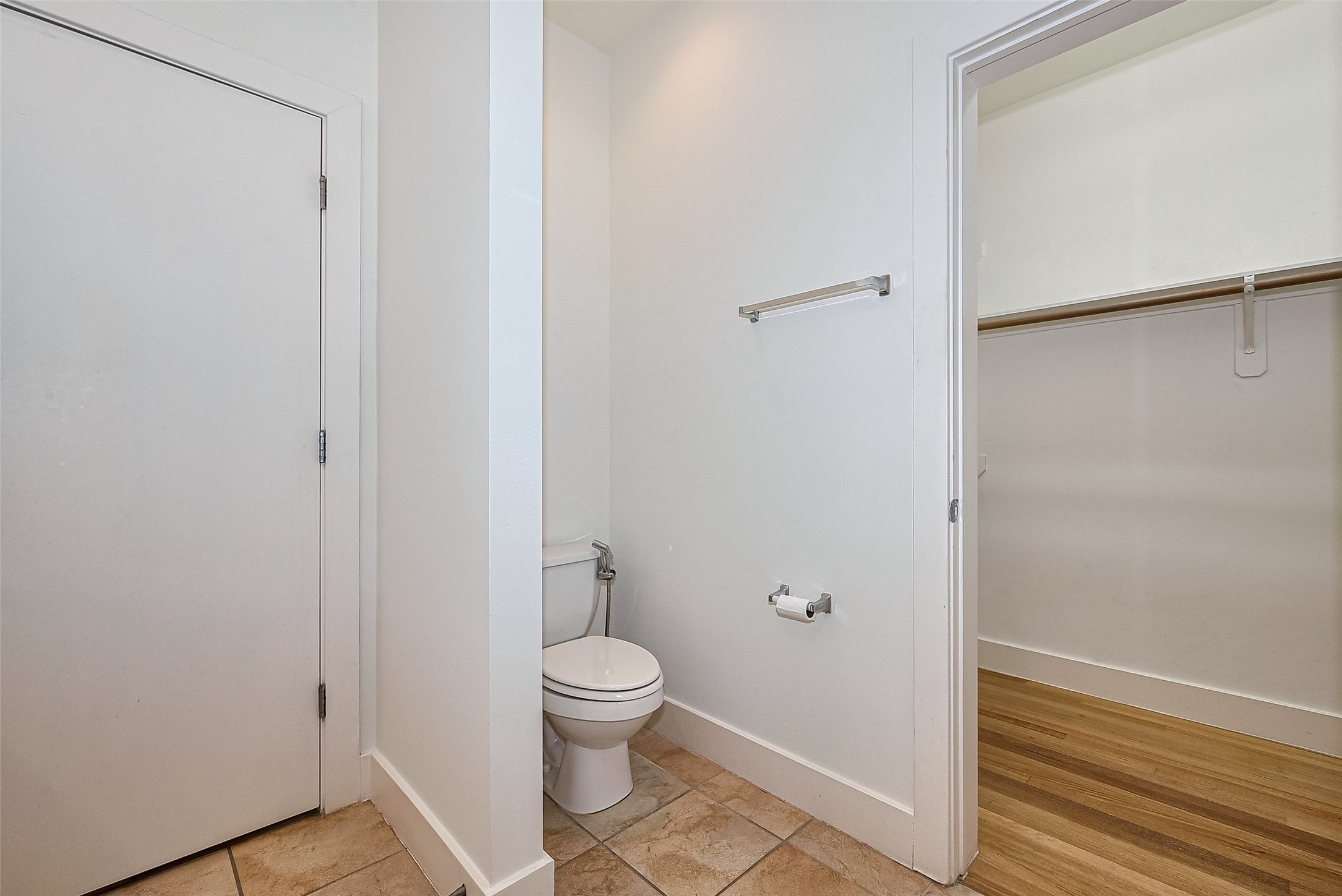 4331 Eigel Street Houston, TX 77007 - Photo 31 of 38 a white toilet sitting next to a shower