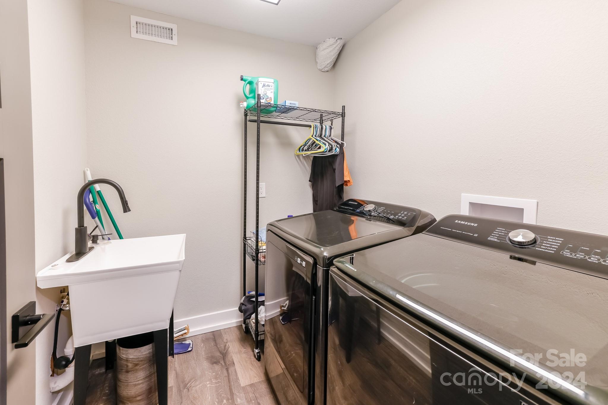 997 Proctor Road Lake Lure, NC 28746 - Photo 19 of 43 a utility room with dryer washer and sink