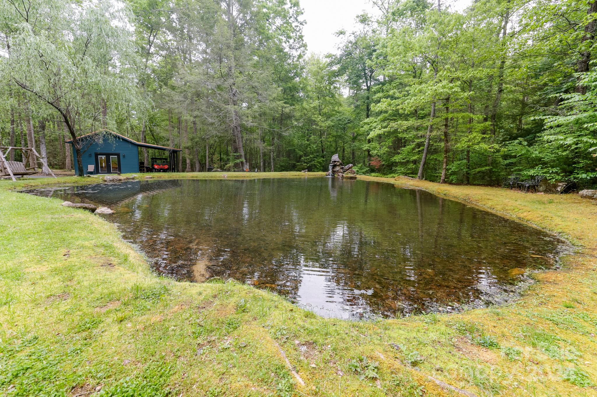 997 Proctor Road Lake Lure, NC 28746 - Photo 29 of 43 a view of a swimming pool with a yard