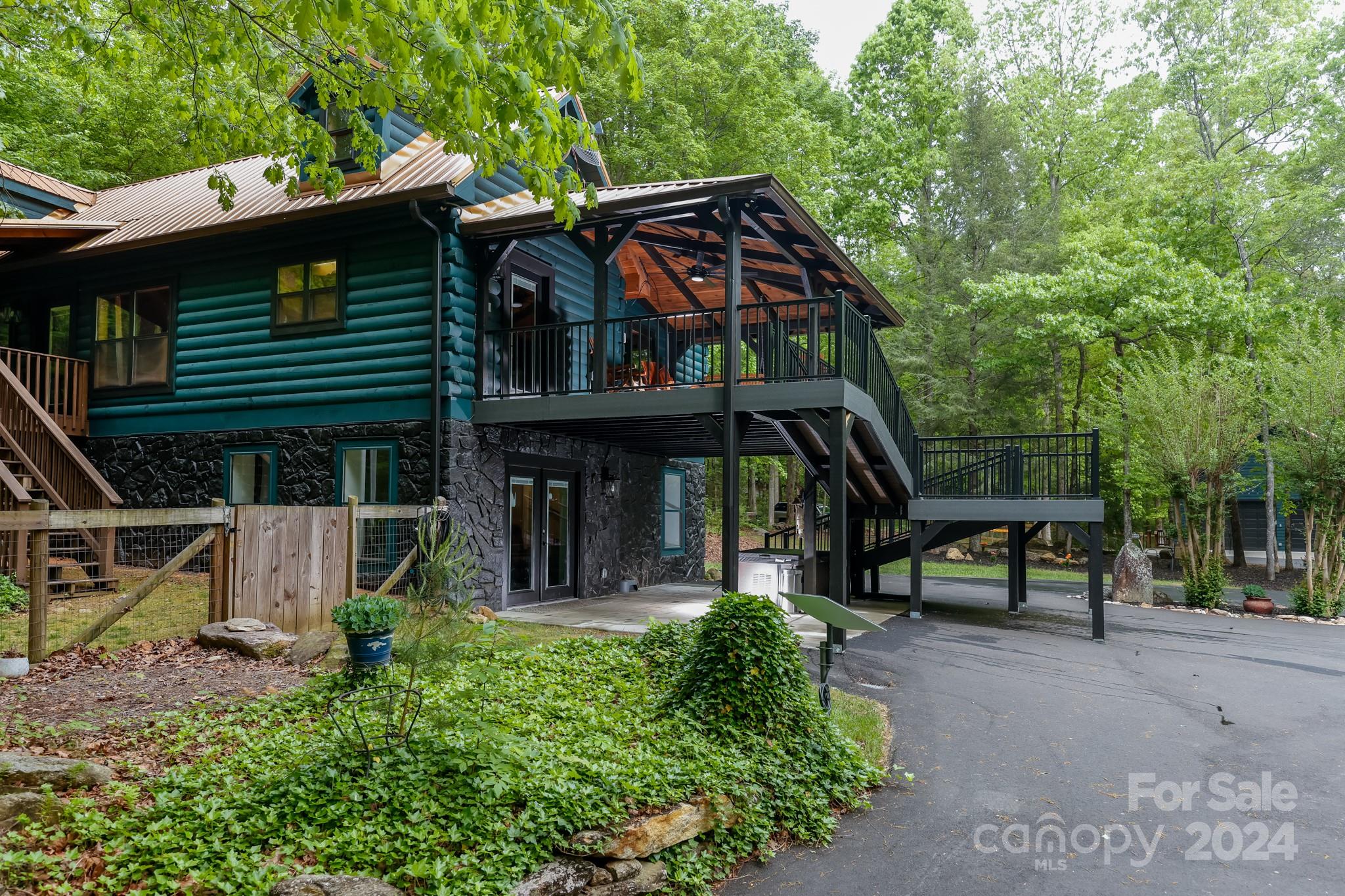 997 Proctor Road Lake Lure, NC 28746 - Photo 3 of 43 a view of an outdoor sitting space