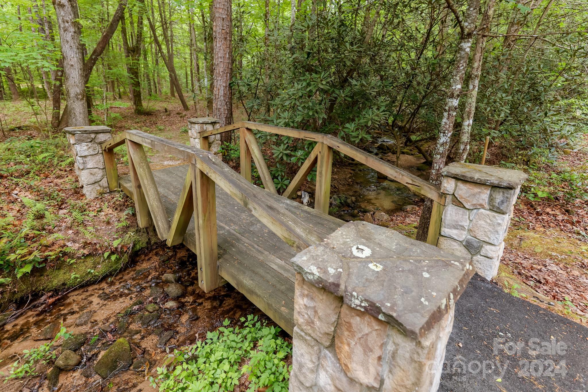 997 Proctor Road Lake Lure, NC 28746 - Photo 31 of 43 a view of a balcony with two chairs and a table