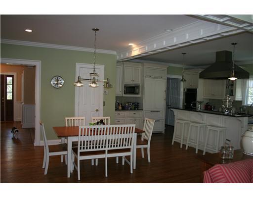 27 Laforge Road Darien, CT 06820 - Photo 11 of 20 a view of kitchen with furniture and wooden floor