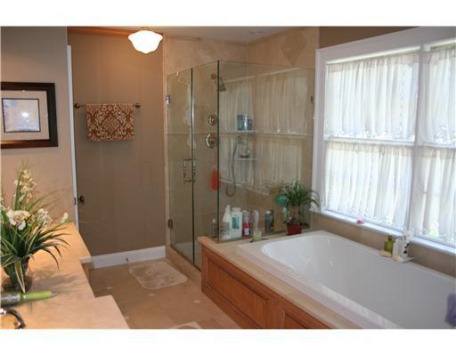 27 Laforge Road Darien, CT 06820 - Photo 15 of 20 a bedroom with a bed and a window