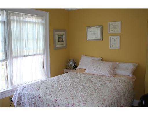 27 Laforge Road Darien, CT 06820 - Photo 18 of 20 a bedroom with a bed and a window