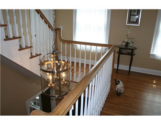 27 Laforge Road Darien, CT 06820 - Photo 20 of 20 a view of entryway and hall with wooden floor
