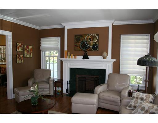 27 Laforge Road Darien, CT 06820 - Photo 5 of 20 a living room with furniture and a fireplace