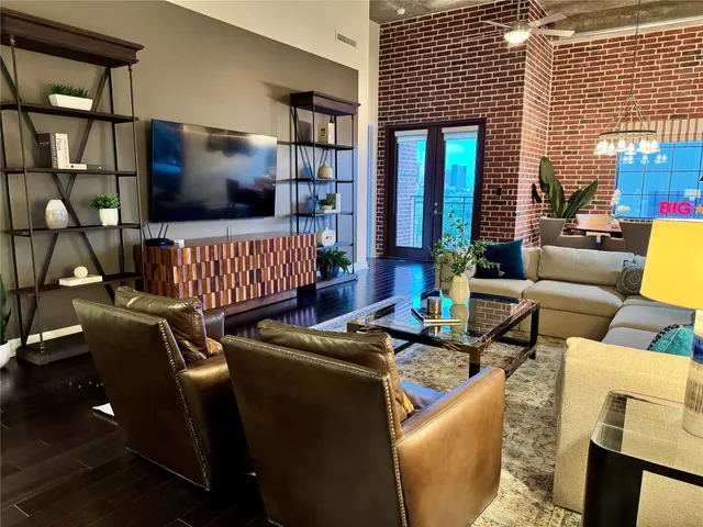 a kitchen with stainless steel appliances granite countertop a stove and a refrigerator