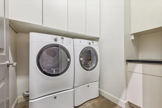 a bathroom with a toilet and a sink